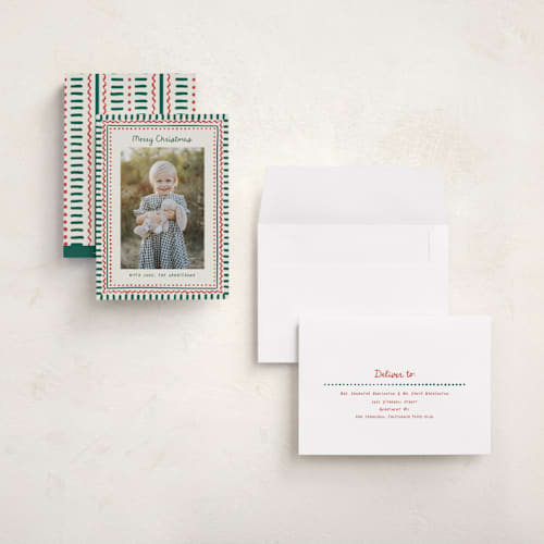 This is a forest holiday photo cards with standard by Chris Griffith called holiday dots printing on signature in grand