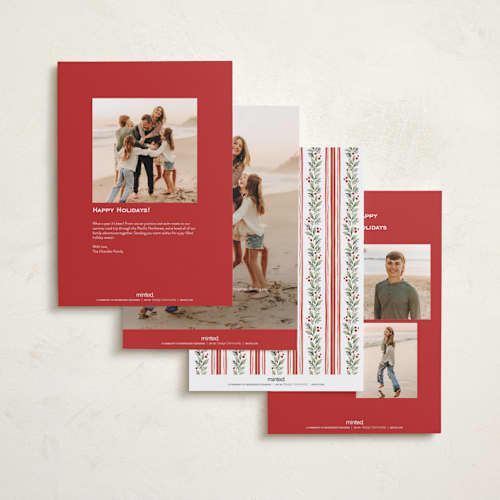 This is a holly berry holiday photo cards with standard by Wildfield Paper Co called eucalyptus + holly printing on signature in grand