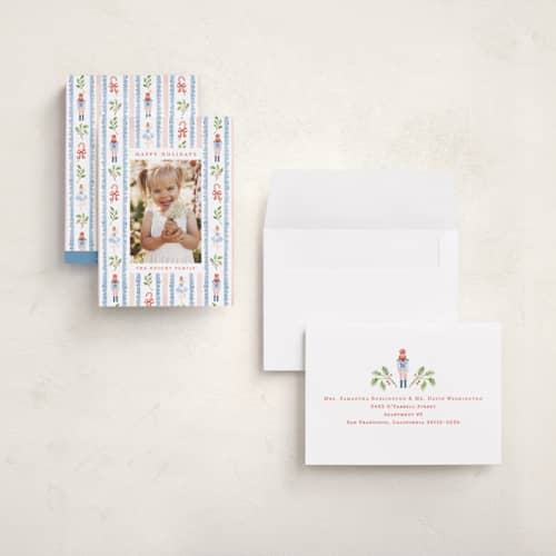 This is a blue spruce holiday photo cards with standard by Sarah Knight called nutcracker pattern printing on signature in grand