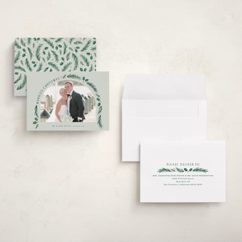 This is a sage holiday photo cards with standard by Hooray Creative called a married christmas printing on recycled smooth signature in grand