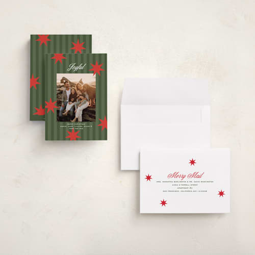 This is a spruce holiday photo cards with standard by Owl and Toad called constellation printing on signature in grand
