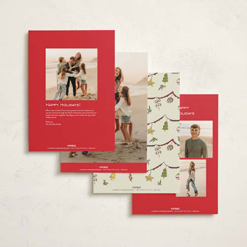 This is a holly berry holiday photo cards with standard by Sarah Rosenthal called garland cheer printing on signature in grand