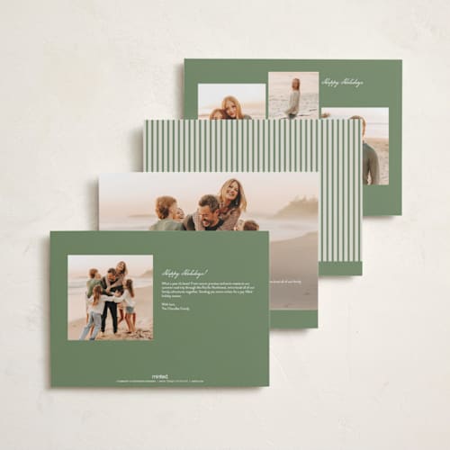 This is a mistletoe holiday photo cards with standard by Wildfield Paper Co called happiest! printing on signature in grand