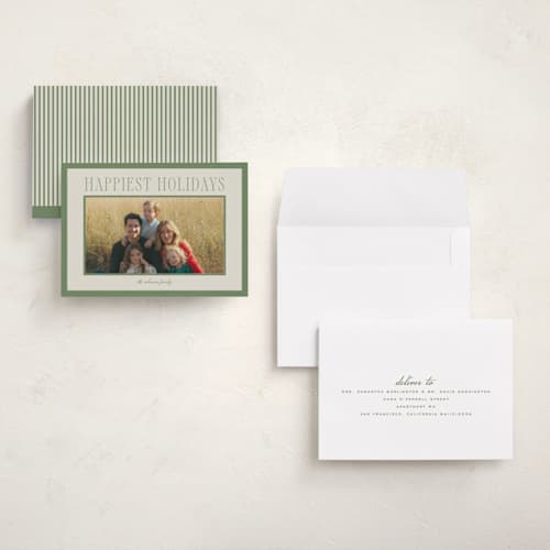 This is a mistletoe holiday photo cards with standard by Wildfield Paper Co called happiest! printing on signature in grand