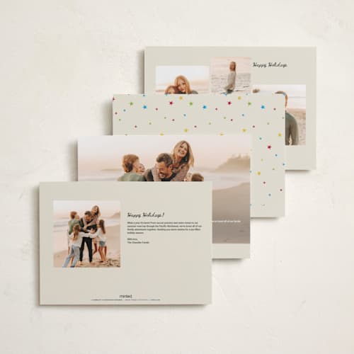 This is a champagne holiday photo cards with standard by Ilene Guy called bright star printing on signature in grand