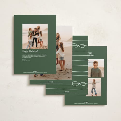 This is a snow holiday photo cards with standard by Lauren Chism called cascading bow printing on recycled smooth signature in grand