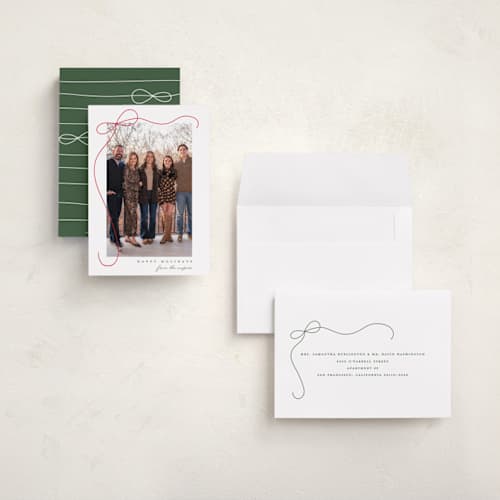 This is a snow holiday photo cards with standard by Lauren Chism called cascading bow printing on recycled smooth signature in grand