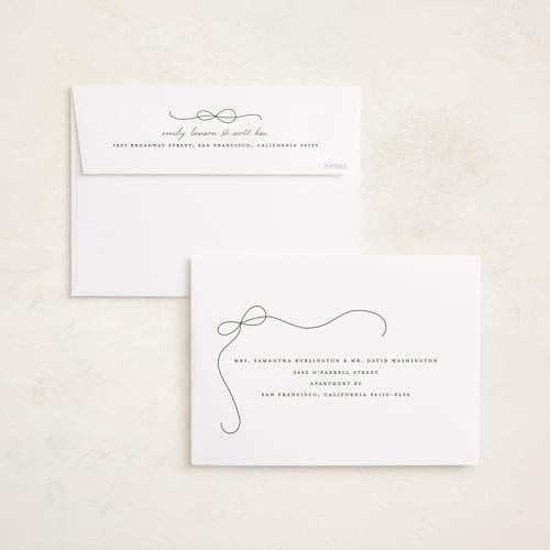 This is a snow holiday photo cards with standard by Lauren Chism called cascading bow printing on recycled smooth signature in grand