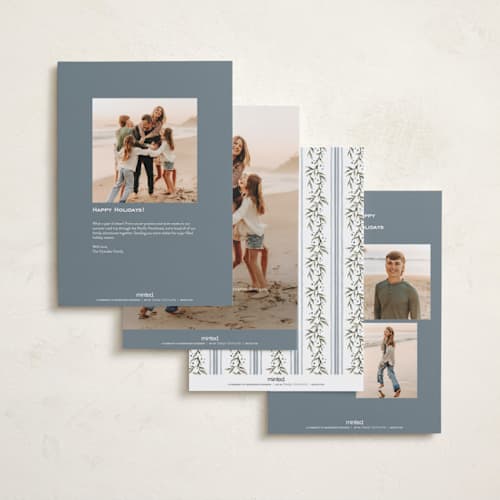 This is a juniper holiday photo cards with standard by Wildfield Paper Co called laurel wreath printing on signature in grand