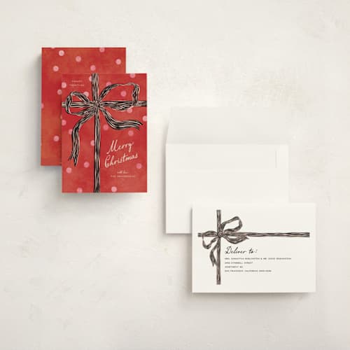This is a holly holiday photo cards with standard by Pixel and Hank called bow printing on signature in grand