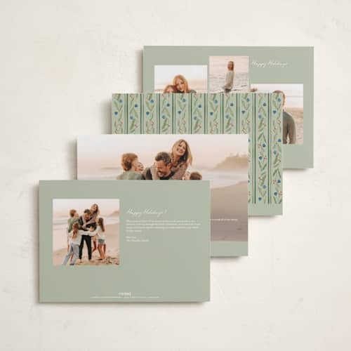 This is a pine holiday photo cards with standard by Amy Kross called verdant printing on signature in grand
