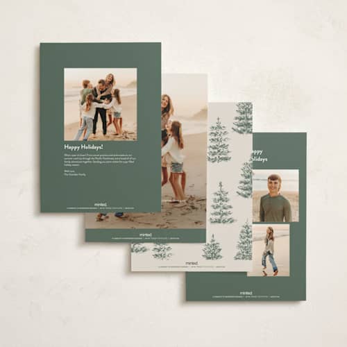 This is a champagne holiday photo cards with standard by Angela Garrick called festive forest printing on signature in grand