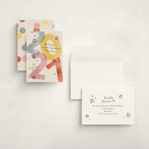 This is a party holiday photo cards with standard by Pixel and Hank called new year stars printing on signature in grand