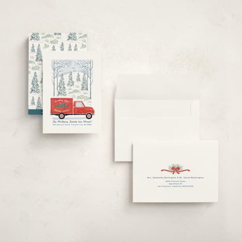 This is a pomegranate holiday photo cards with standard by Paper Sun Studio called moving along printing on signature in grand