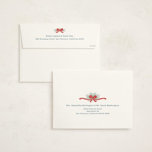 This is a pomegranate holiday photo cards with standard by Paper Sun Studio called moving along printing on signature in grand