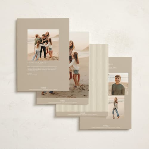 This is a periwinkle holiday photo cards with standard by Robert and Stella called wreath frame printing on signature in grand