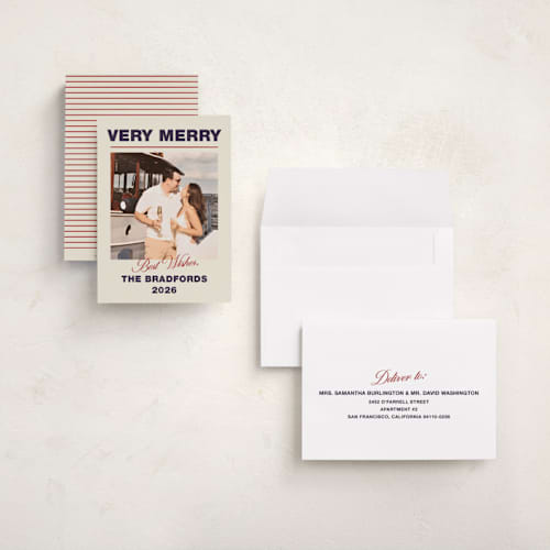 This is a navy holiday photo cards with standard by Ani Somi called masthead printing on signature in grand