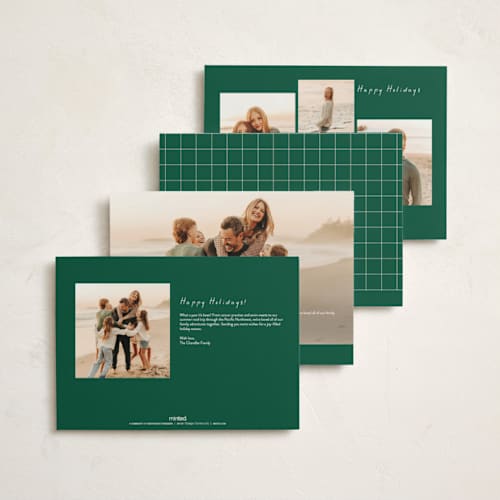 This is a holly holiday photo cards with standard by Sarah Hawkins Designs called year of growth printing on signature in grand