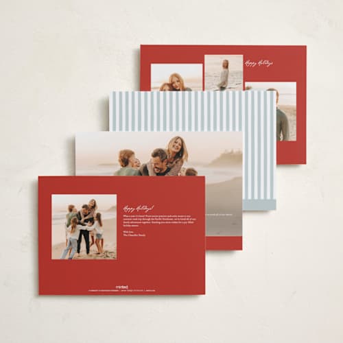 This is a holly berry holiday photo cards with standard by Wildfield Paper Co called laurel border printing on signature in grand