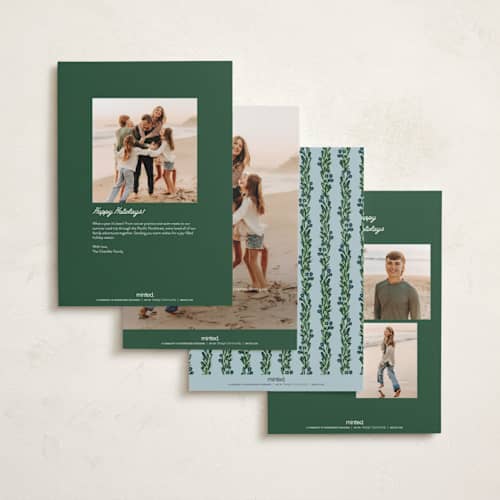 This is a garland holiday photo cards with standard by Claudia Orengo called mistletoe printing on signature in grand