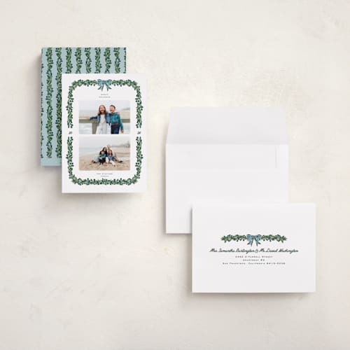 This is a garland holiday photo cards with standard by Claudia Orengo called mistletoe printing on signature in grand