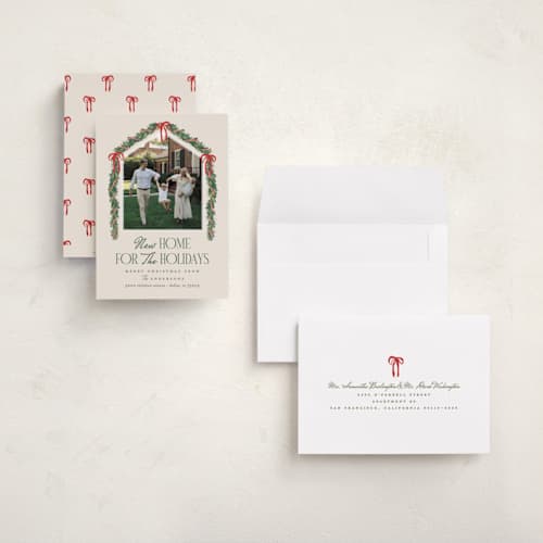 This is a ivory holiday photo cards with standard by Julie Murray called happy new home printing on signature in grand