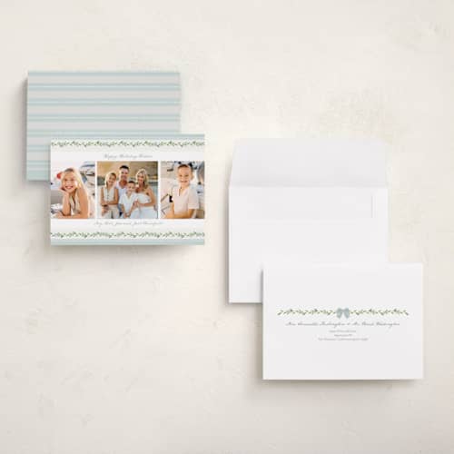 This is a coastal holiday photo cards with standard by Susan Moyal called holiday bows printing on signature in grand