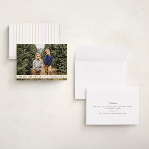 This is a cream holiday photo cards with standard by Baumbirdy called ribbon overlay printing on signature in grand
