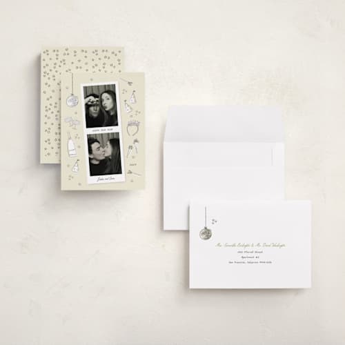 This is a champagne holiday photo cards with standard by frau brandt called new year fun printing on signature in grand