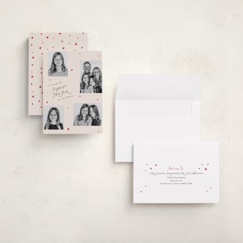 This is a champagne holiday photo cards with standard by Ilene Guy called starry year printing on signature in grand