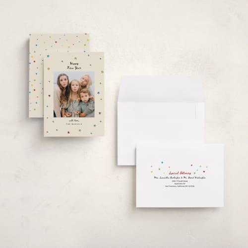 This is a champagne holiday photo cards with standard by Ilene Guy called bright star printing on signature in grand