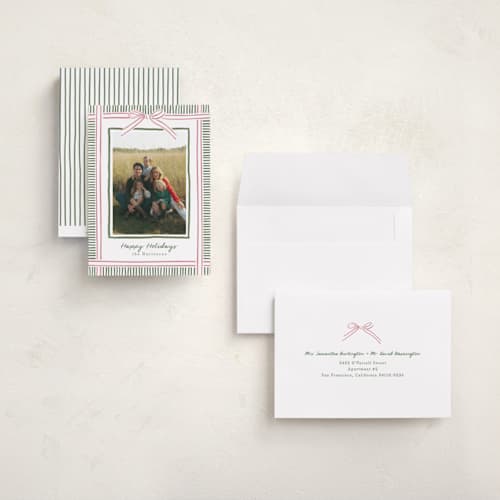 This is a pink sand holiday photo cards with standard by Chris Griffith called holiday wrap printing on recycled smooth signature in grand
