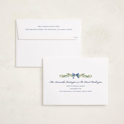 This is a chambray holiday photo cards with standard by Sarah Knight called gingham garland printing on signature in grand