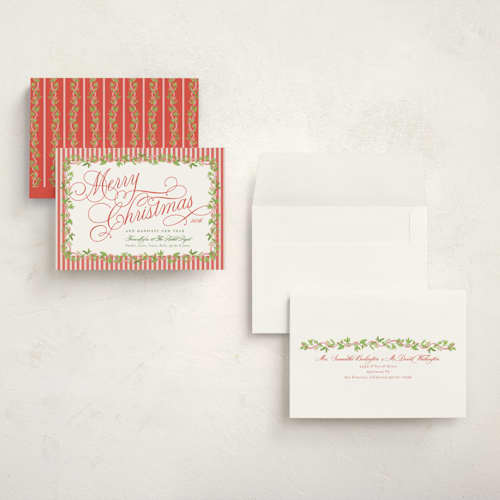 This is a cranberry holiday photo cards with standard by Erika Firm called holly ribbon printing on signature in grand