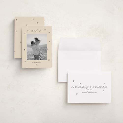 This is a vanilla holiday photo cards with standard by Benita Crandall called hand drawn stars printing on signature in grand