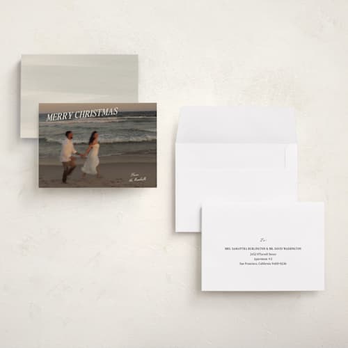 This is a cream holiday photo cards with standard by Ani Somi called coastal holiday printing on signature in grand