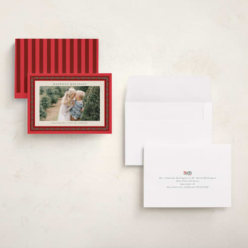 This is a holly berry holiday photo cards with standard by Kristie Kern called revelry printing on signature in grand