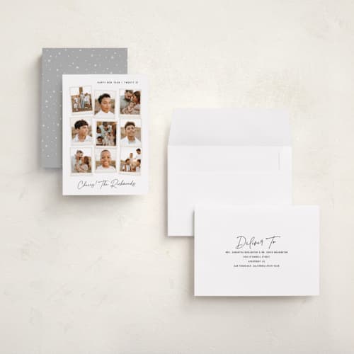 This is a snow holiday photo cards with standard by Hooray Creative called nine snapshots printing on recycled smooth signature in grand