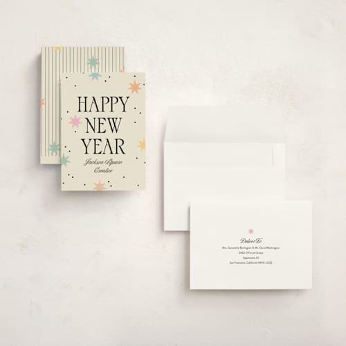 This is a cream holiday photo cards with standard by Robert and Stella called new year stars printing on signature in grand