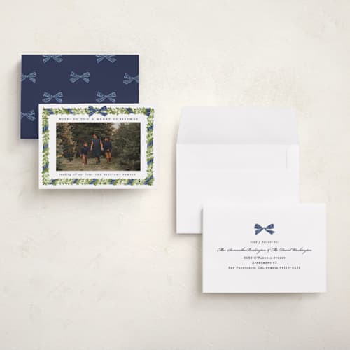 This is a navy holiday photo cards with standard by Sarah Knight called plaid ribbon printing on signature in grand