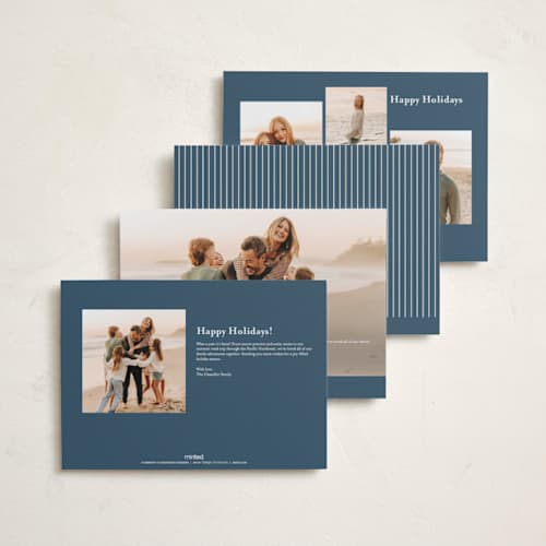 This is a blue spruce holiday photo cards with standard by Petra Kern called oasis printing on signature in grand