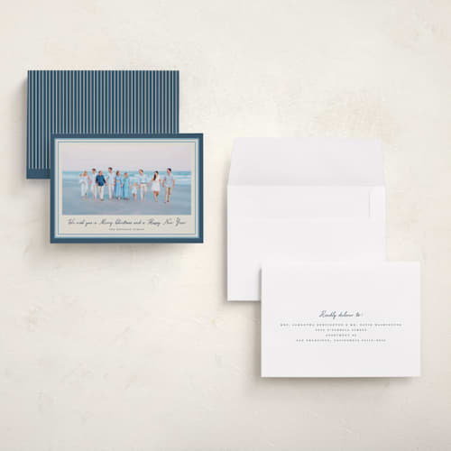 This is a blue spruce holiday photo cards with standard by Petra Kern called oasis printing on signature in grand