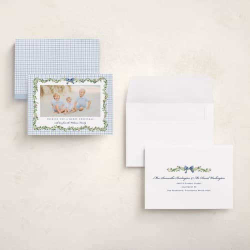 This is a chambray holiday photo cards with standard by Sarah Knight called gingham garland printing on signature in grand