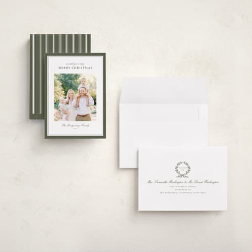 This is a pine holiday photo cards with standard by Wildfield Paper Co called celadon printing on signature in grand