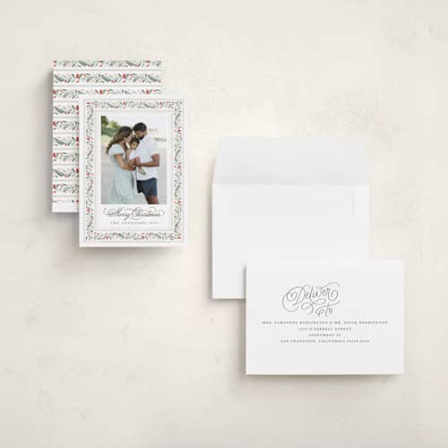 This is a berry holiday photo cards with standard by Kristen Smith called painted garland printing on recycled smooth signature in grand
