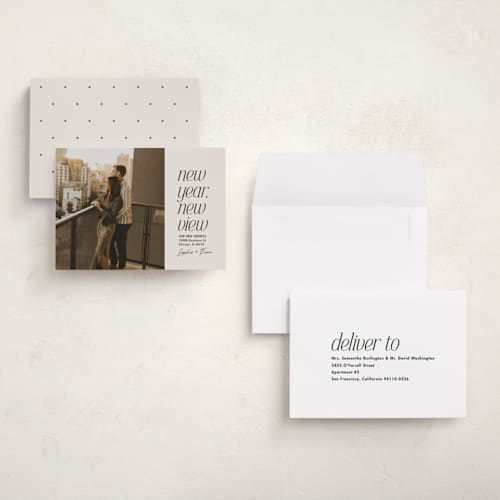 This is a vanilla holiday photo cards with standard by Lea Delaveris called new view printing on recycled smooth signature in grand