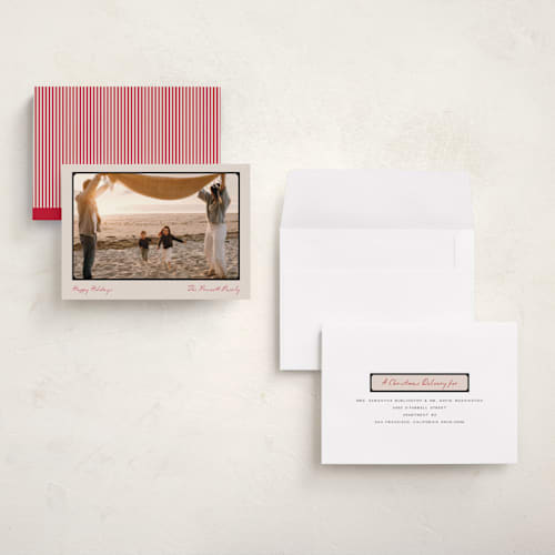 This is a cranberry holiday photo cards with standard by Pixel and Hank called reverie printing on signature in grand
