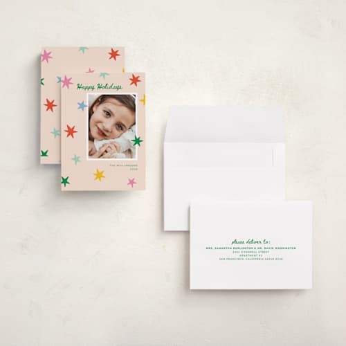 This is a pink sky holiday photo cards with standard by Kristen Magee called star pop printing on signature in grand
