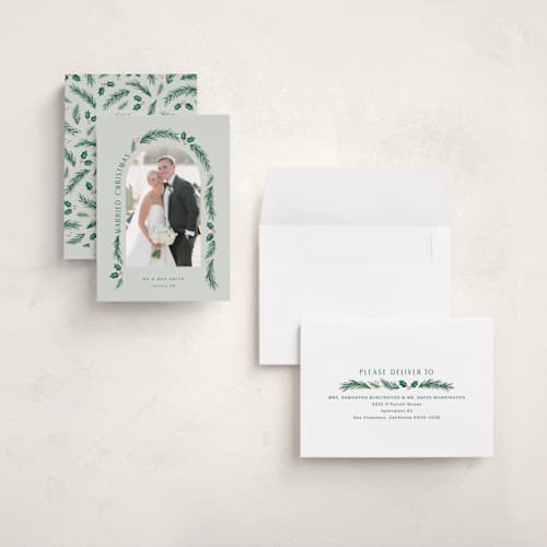 This is a sage holiday photo cards with standard by Hooray Creative called a married christmas printing on recycled smooth signature in grand