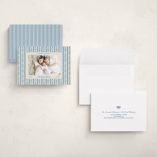 This is a ice holiday photo cards with standard by Pati Cascino called hollis printing on signature in grand